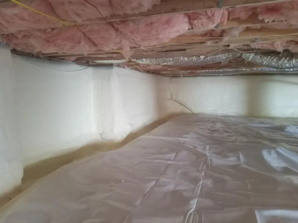 Crawl space encapsulation with closed-cell spray foam for Commercial Roof Restoration in South Boston